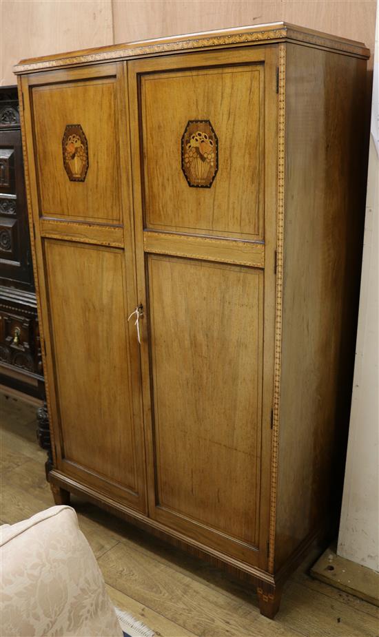 An Art Deco walnut and marquetry wardrobe, probably by Bath Cabinet Makers W.107cm